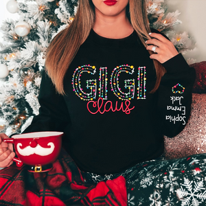 Gigi Claus Christmas lights And Grandkids Personalized Christmas Merry Sweatshirt